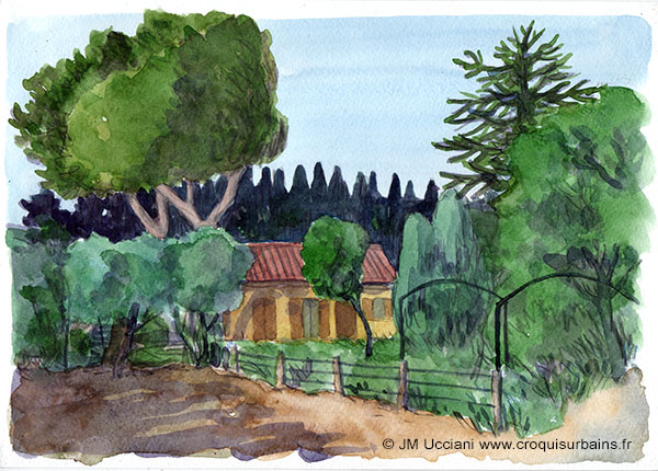 La petite maison jaune dans un jardin provençal